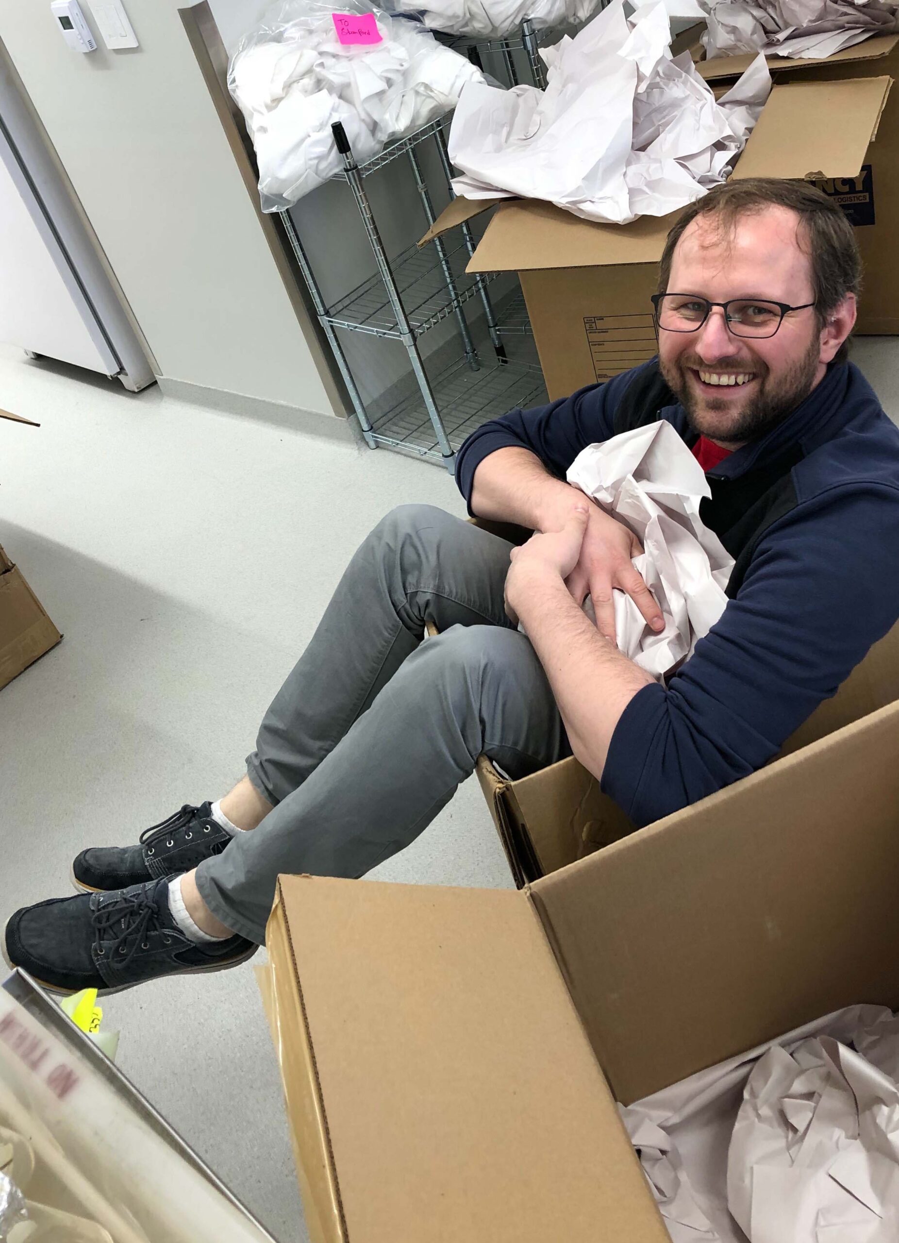 Me in box during unpack in CA